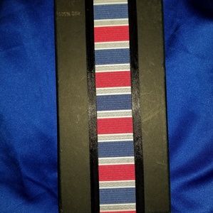 A Trio Suit Accessory Set